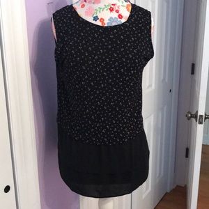 Sleeveless tank blouse.